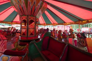 A view inside of a vintage wooden fair ride.