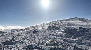 Very strong winds blowing snow on top of Stob Coire an t-Sneachda