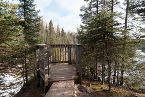 A small wooden lookout from above the Baptism river.