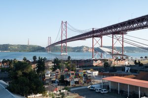 Looking out from high up at the 25 de Abril Bridge and Village Underground.