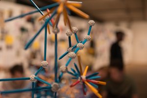 Small coloured plastic pieces join together to make geometric shapes.