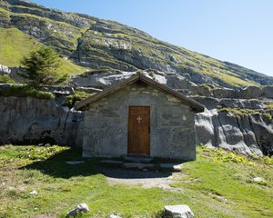 Looking straight on to the Chapelle de Sales in bright sunlight.
