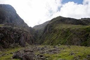 Looking up an ominous rock formation near Scafell Pike