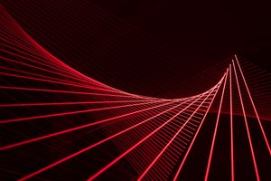 Red lasers in a dark room form lines at regular angles, sweeping a curve to the left.