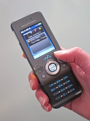 A phone receiving an SMS alert.