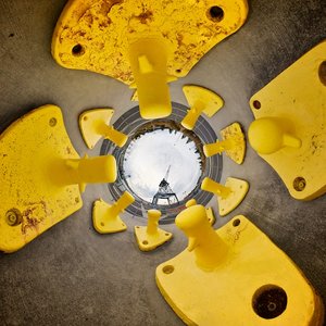 Reverse stereographic panorama of yellow harbour anchors.