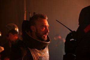 A marine talks to a fellow soldier.