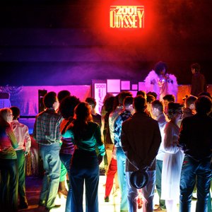 A group of people on a dance floor.